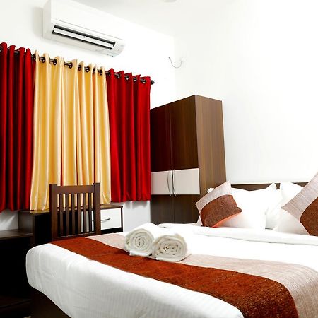 Puthens Clifton Inn Kottayam Exterior foto