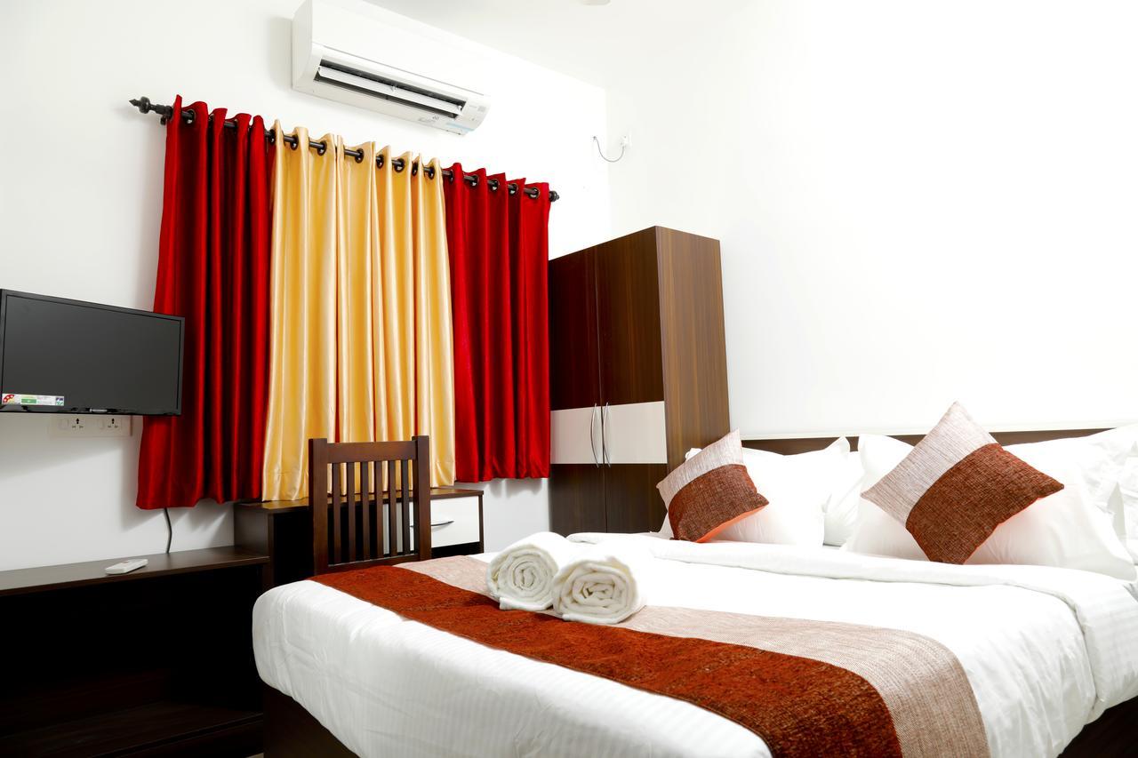Puthens Clifton Inn Kottayam Exterior foto