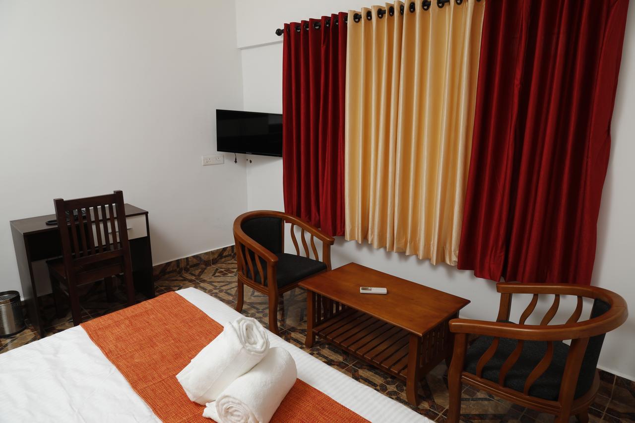 Puthens Clifton Inn Kottayam Exterior foto
